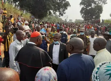Reverend Nicolas Guerekoyame-Gbangou, Cardinal Dieudonné Nzapalainga and Imam Abdoulaye Ouasselogue meet with a crowd in Central African Republic