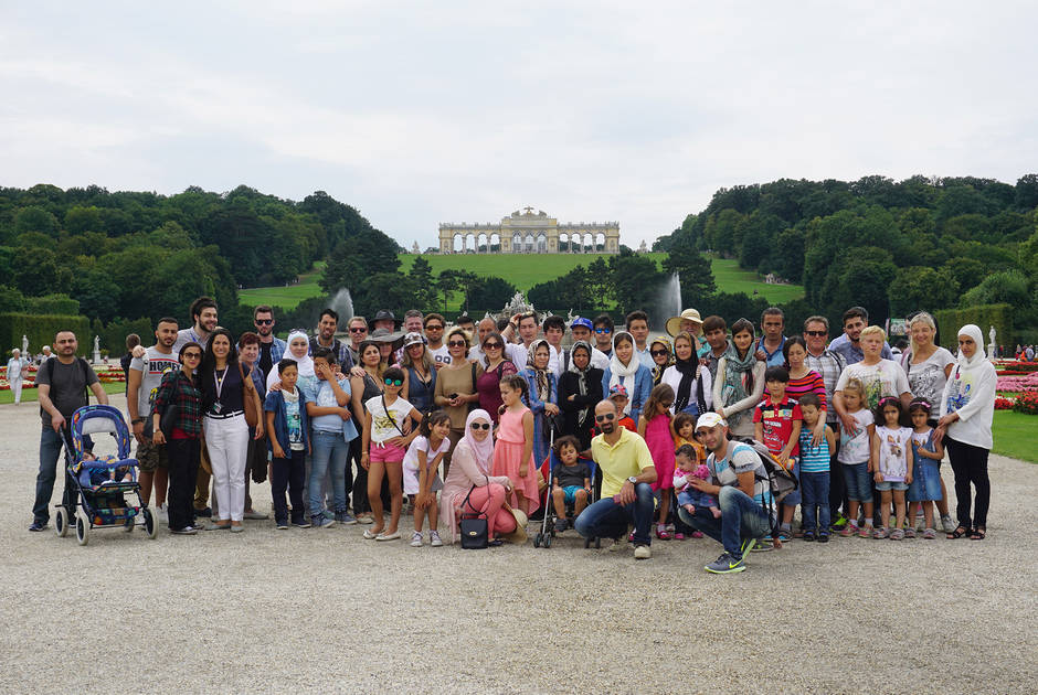 Programme participants stand before the Gloriette, a Viennese landmark located at the Schönbrunn palace in Vienna, Austria. Schonbrunn