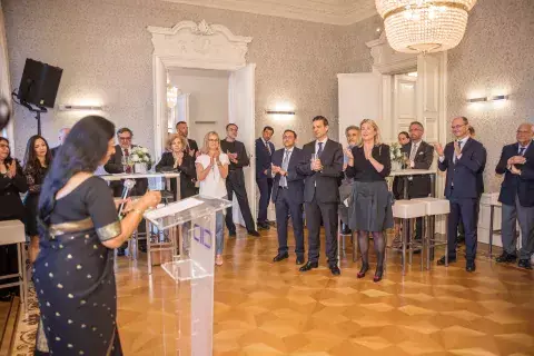 Guests at the Centre´s farewell evening listen to the remarks of Board Member Dr. Kezevino Aram (Photo: Alexander Müller)