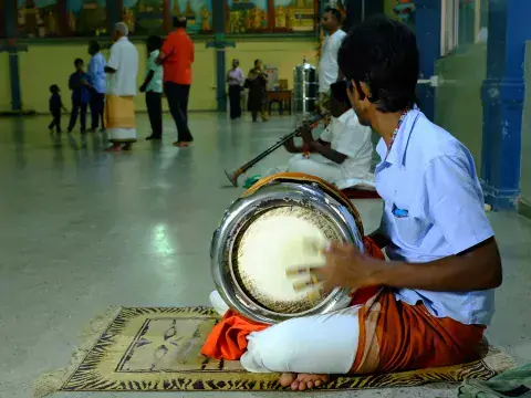 During the visit, the Fellows had the opportunity to observe a ceremony that featured offerings in the form of music. Musicians Perform During the Ceremony