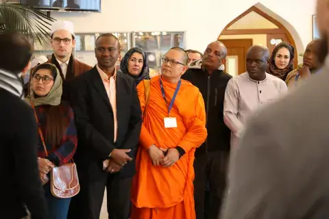 Dr. Auwal Farouk Abdussalam visiting houses of worship in Vienna as part of his activity in the KAICIID Fellows Programme (2018) Dr. Auwal Farouk Abdussalam visiting houses of worship in Vienna as part of his activity in the KAICIID Fellows Programme (2018)