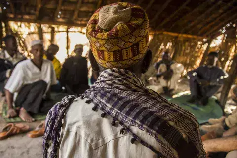 A muslim man takes part in a religious gathering in CAR. Photo: Jack Losh