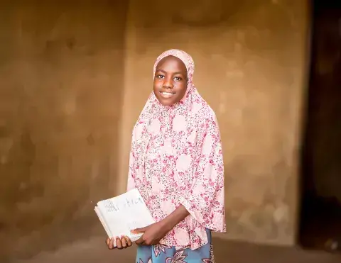 Aisha, a student at the school, who dreams of becoming a doctor. Photo: Godwin Oisi