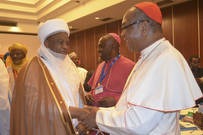 The Archbishop of Abuja, Cardinal John Onaiyekan welcomes the Sultan of Sokoto, Alhaji Saad Abubakar III.