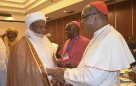 The Archbishop of Abuja, Cardinal John Onaiyekan welcomes the Sultan of Sokoto, Alhaji Saad Abubakar III.